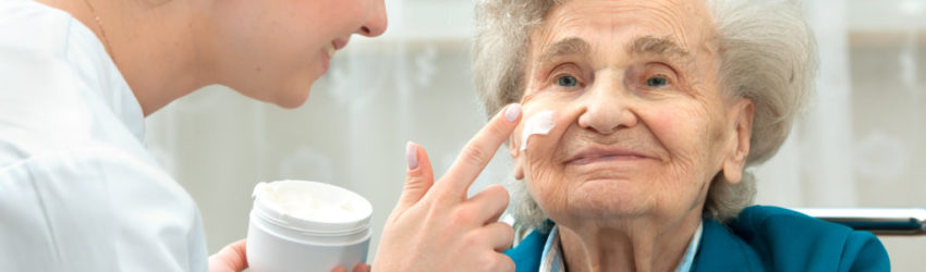 Elderly woman is assisted by nurse at home Elderly woman is assisted by nurse at home